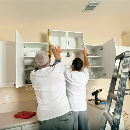 san-diego-kitchen-remodeling-contractor A sleek modern bathroom featuring a glass shower stall and modern fixtures.